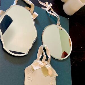 Elegant Silver Hanging Mirrors you can change out the ribbon all three
